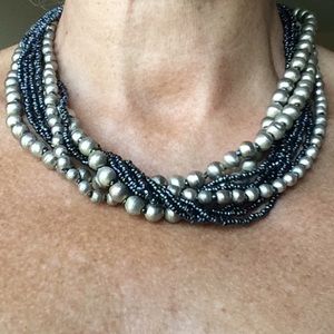 Silver tone necklace.